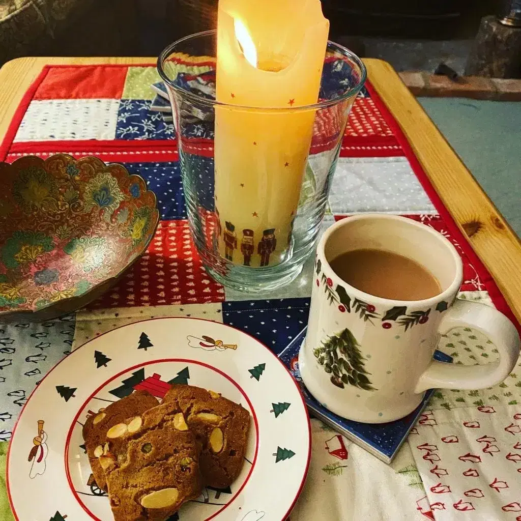 Christmas candle, tea and cookies