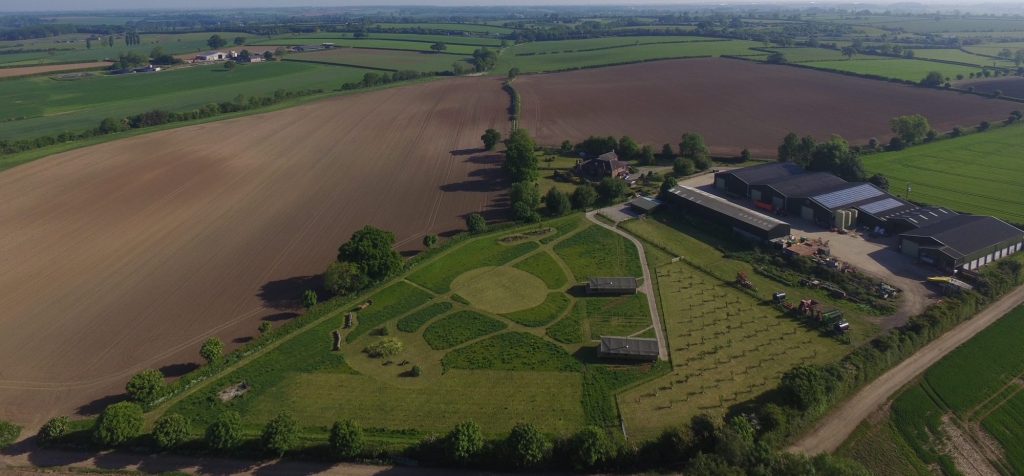 Aerial view of glamping site and farm