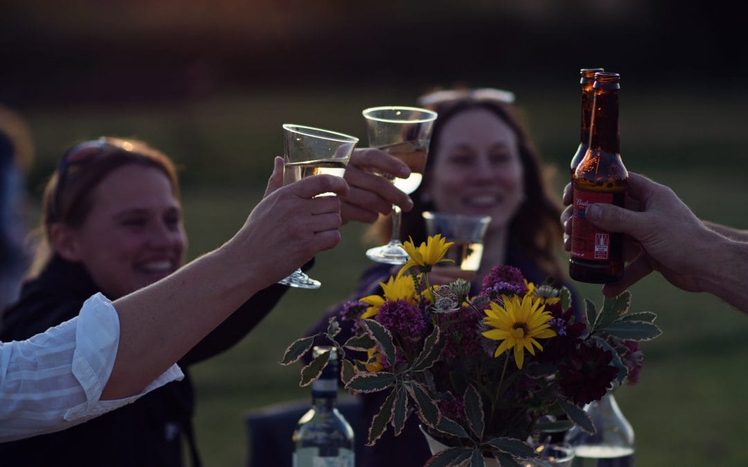 group of happy adults toasting a special occasion