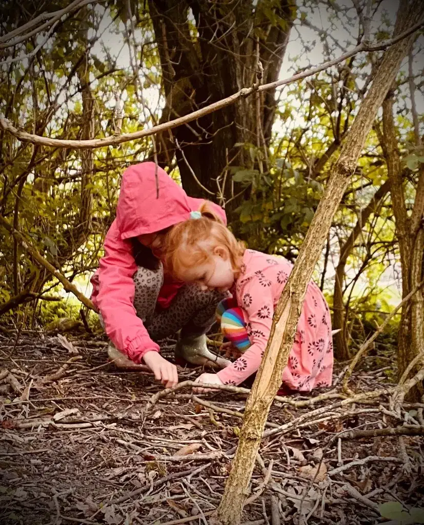children exploring nature and treasure hunting